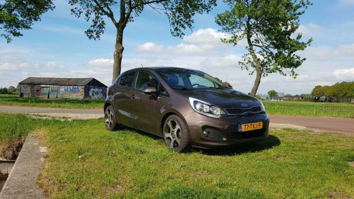 KIA RIO 1.1 Crdi 5DRS 2012 Bruin, dealer onderhouden. 1e eig