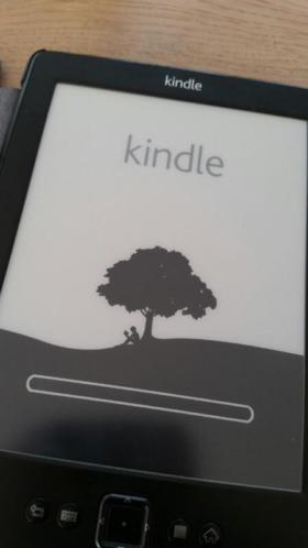 Kindle e-ink 6034 reader met cover, lader en veel boeken