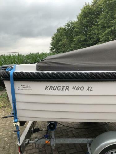 Kruger 480XL met buitenboordmotor en trailer