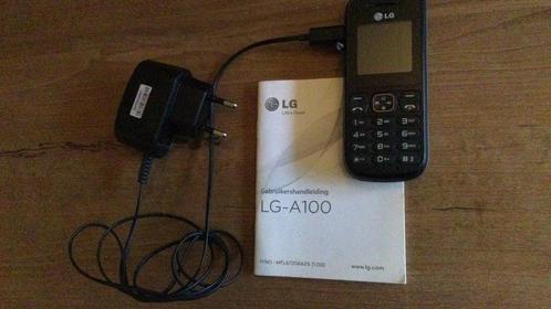 LG-A100 mobile phone met oplader en boekje