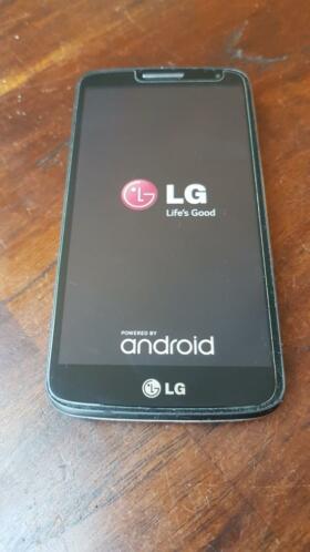 LG G2 mini met oplader en hoesje. 