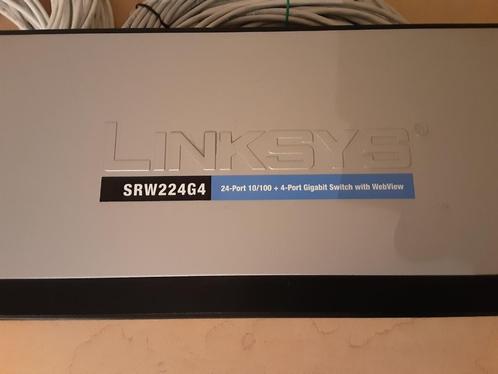 Linksys switch 24ports100Mb 4ports1Gb  10 kabels 15 euro