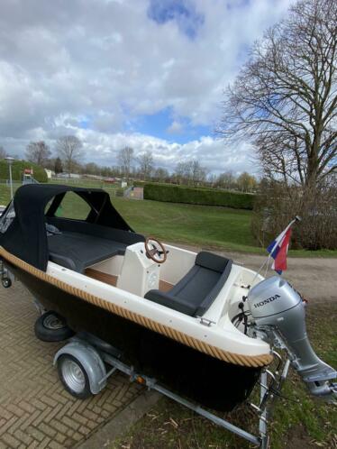 Luxe sloep 5meter inclusief 8pk4t Honda motorpega trailer