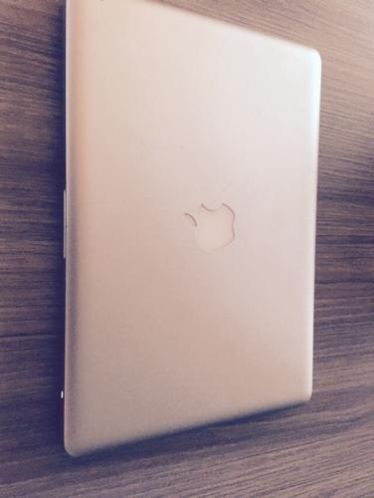 MacBook 2008 aluminium hoes en lader