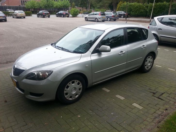 Mazda 3 1.4 Sport Exclusive 2004-Betrouwbaar, ruim amp zuinig