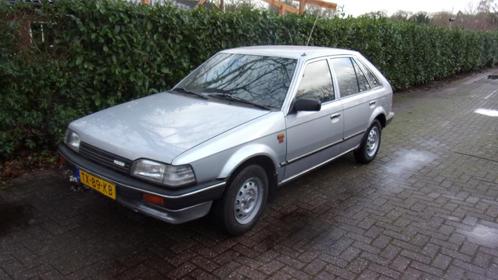 Mazda 323 1.3 HB LX AUT K6 1989 Grijs