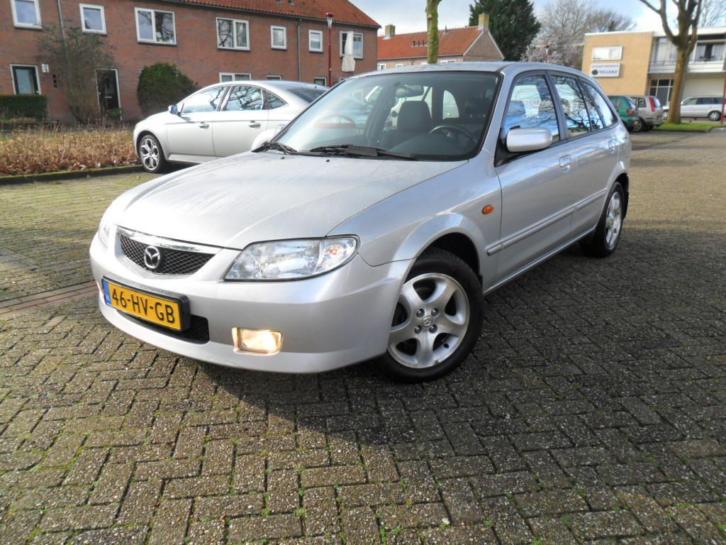 Mazda 323 1.6 F 2002 Zilver NW distributieAPKBeurt TOPPER