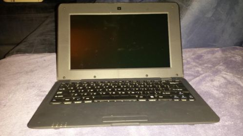 Mini laptop vanhet huismerk Castle met oplader