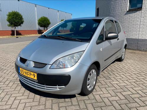 Mitsubishi Colt 1.1 Mivec met Airco en elektr ramen