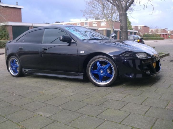 Mooie Mazda 323 1.5 F GX 1997 ZWART ( UITSTEKENDE STAAT )