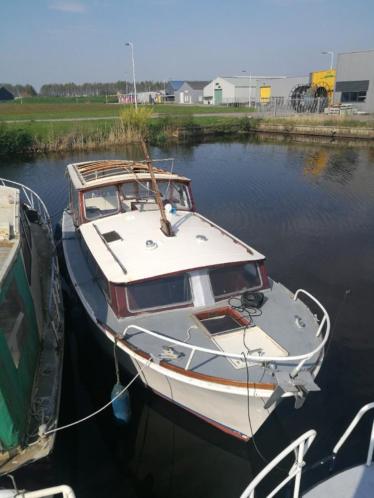 Mooie super van craf kruiser met cabrio kap en houten opbouw