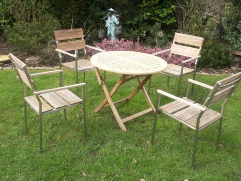 Mooie tuinset - 4 mooie Gloster stoelen  gratis tafel