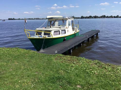 Motorboot met unieke ligplaats inclusie kano