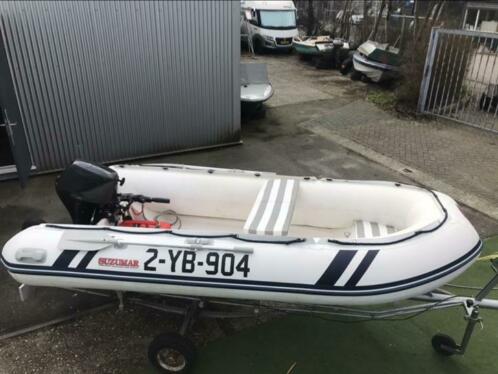 Nette rubberboot met motor 4takt en trailer 