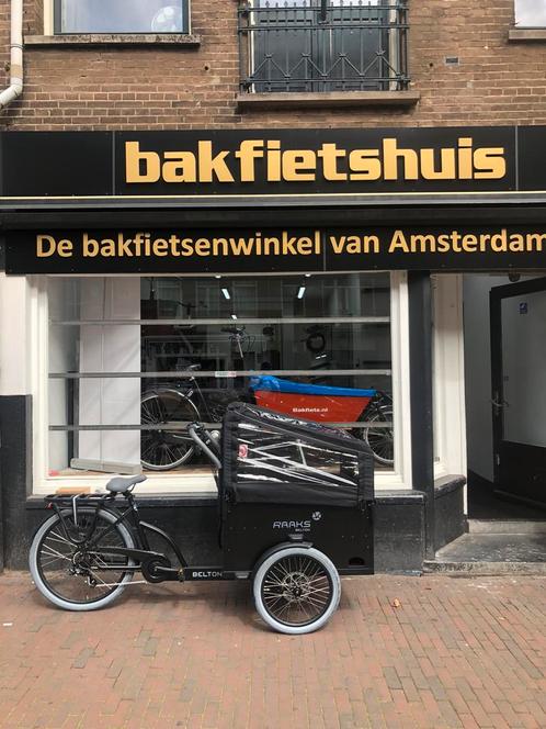 Nieuwe Raaks elektrische bakfiets met regenhuif