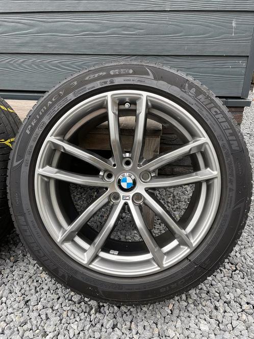 Nieuwstaat 18 originele BMW 5 serie breedset velgen