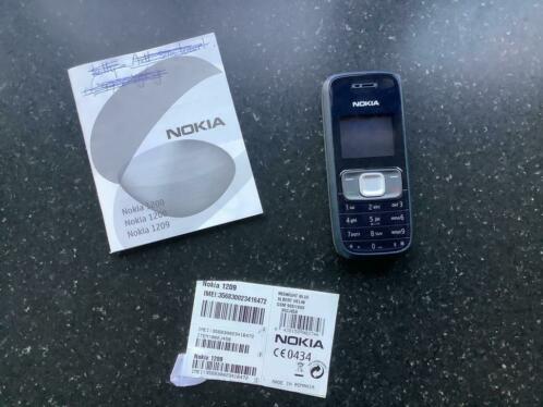 Nokia 1209 met boekje optisch goed