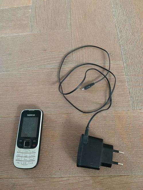 Nokia 2330c met oplader (zonder batterij) werking onbekend