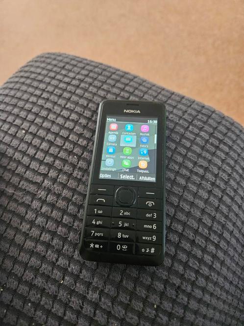 Nokia 301 simlockvrij in nette staat met oplader