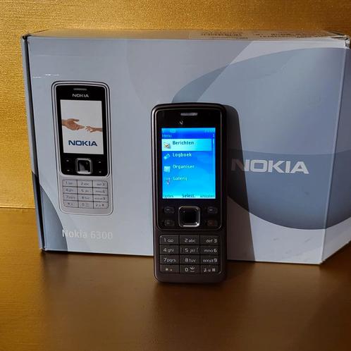 Nokia 6300 compleet met toebehoren.