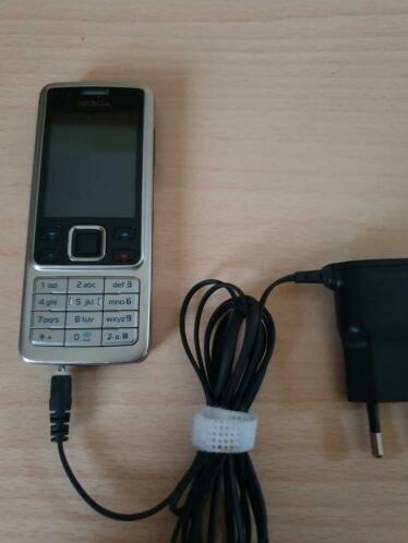 Nokia 6300 met lader