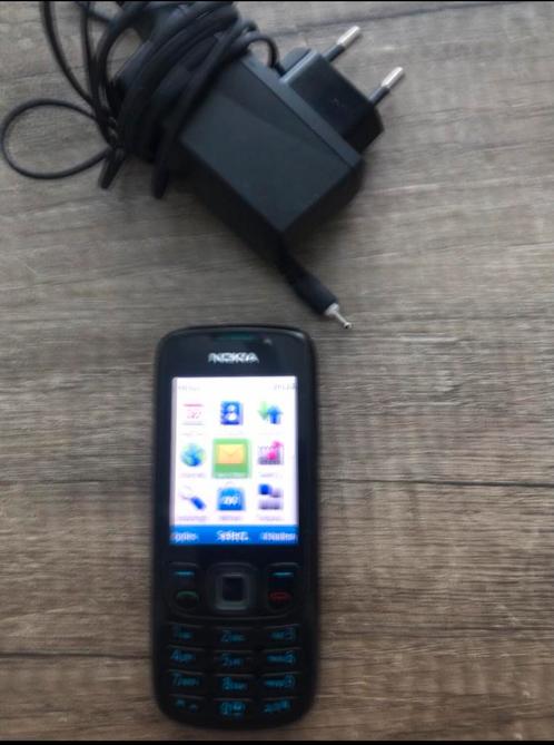 Nokia 6303ci. Telefoon inclusief oplader
