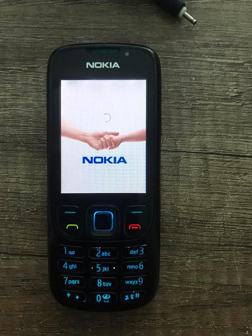 Nokia 6303ci. Telefoon inclusief oplader