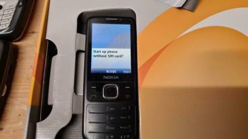 Nokia 6700 Classic in doos met lader en handleiding