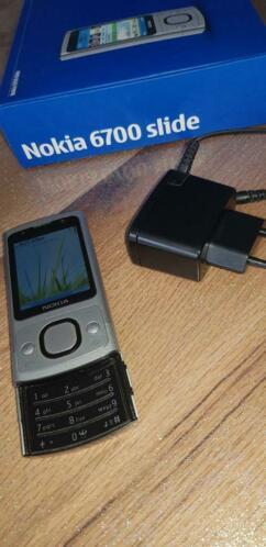 Nokia 6700 slide in nieuw staat werkt perfect
