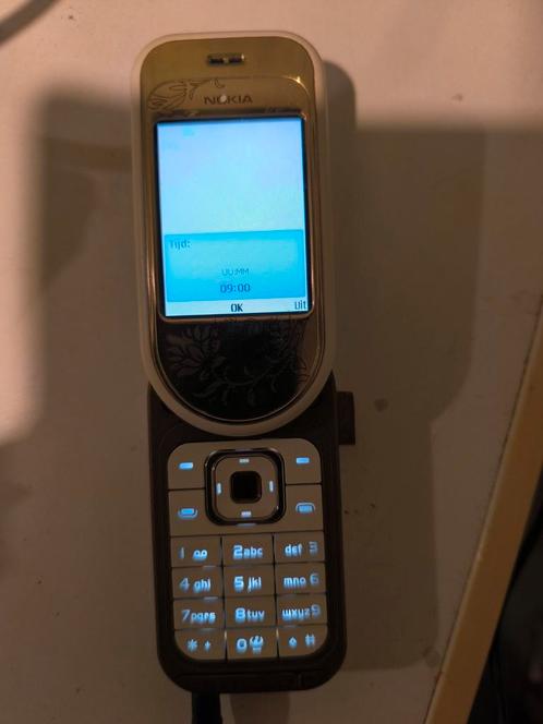 Nokia 7373 met doos en lader