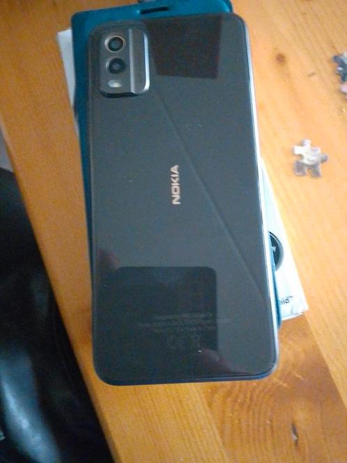 Nokia. C32 met hoesje 2weken oud