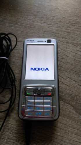 Nokia gsm type N73 maak hele mooi foto,s