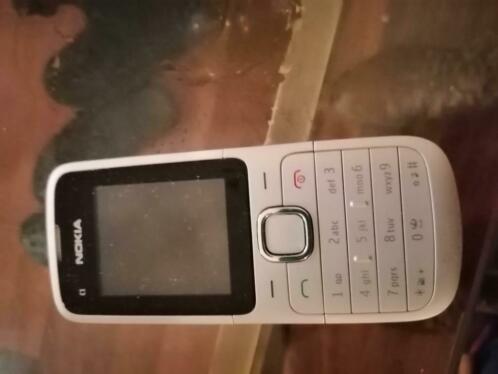 Nokia met camera, Siemens en Apple iPhone zonder oplader