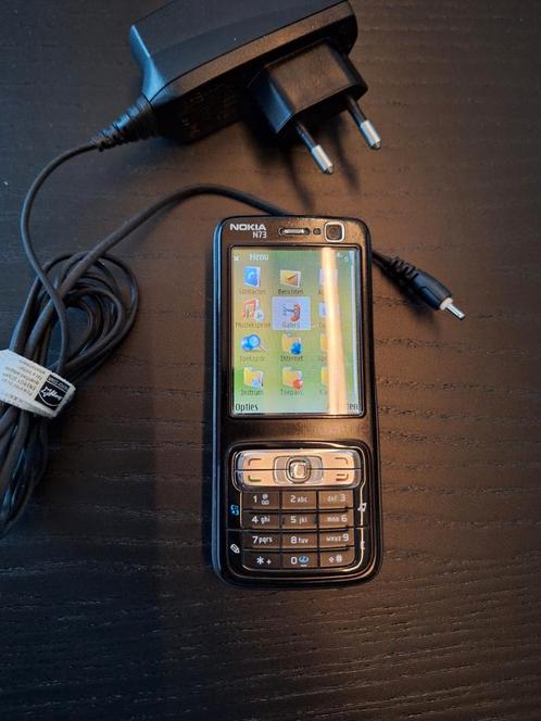 Nokia N73 met 2GB mini SD kaart en originele Nokia lader