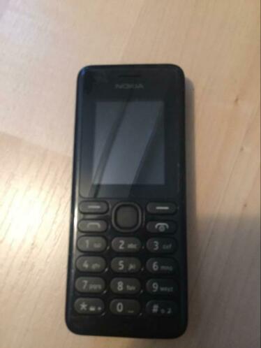 Nokia telefoon met oordopjes