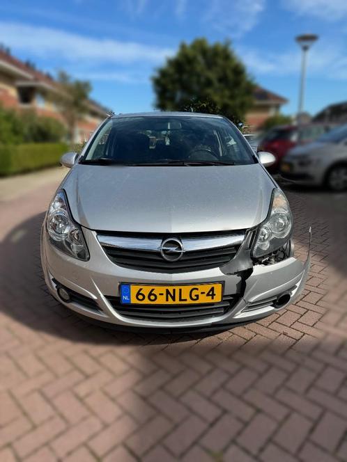 Opel Corsa 1.2 16V 3D 2010 Grijs (Schadeauto)