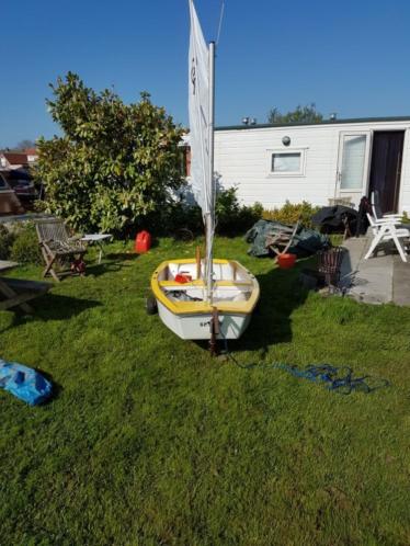 Optimist met handtrailer