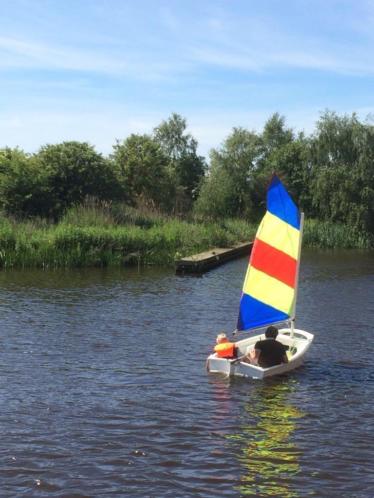 Optimist met trailer