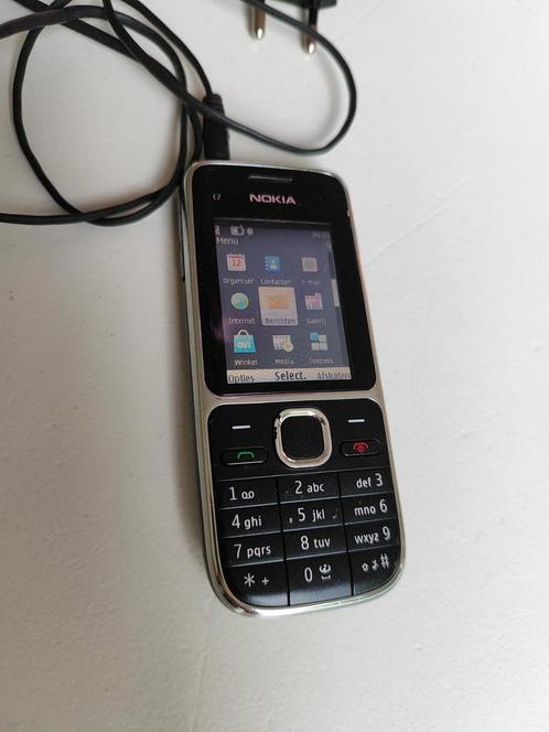 Oude Nokia, werkend, met lader.