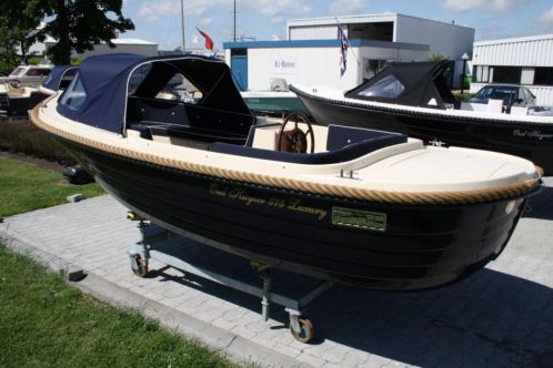 Oudhuijzer 560 2009 met Suzuki 9,9pk en buiskap 