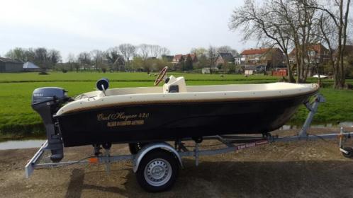 Oudhuyzer sloep met zgan kanteltrailer en motor
