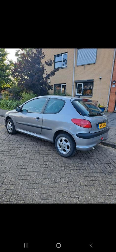 Peugeot 206 1.4 X-line 3D 2002 Grijs leren stoelen