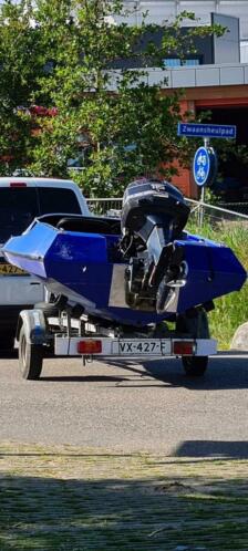 Piranha bagheera met Evinrude 115pk 2 takt