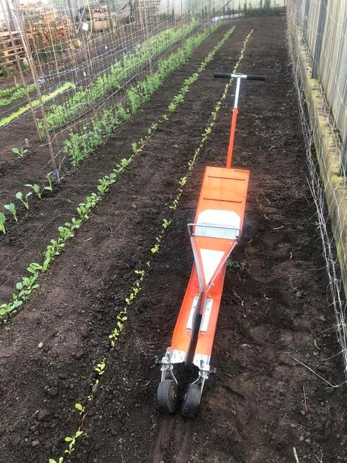 Plantmachine paperpot transplanter