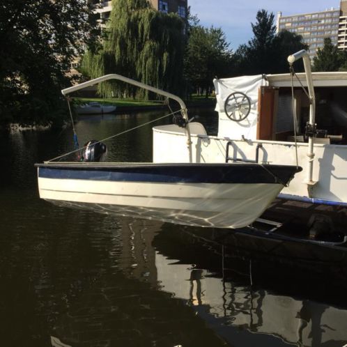 Polyester boot met 4takt 3,5 pk roeispanen kussens ,