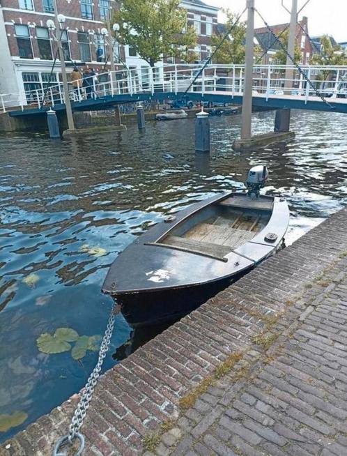 Polyester boot met 5pk mariner motor