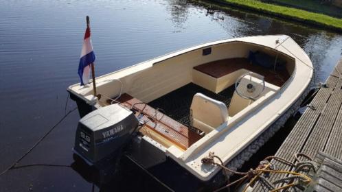 Polyester sloep  grachtenboot incl 9,9 yamaha fourstroke