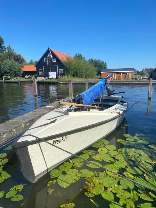 Polyvalk incl. nieuwe buitenboordmotor 4pk en toebehoren