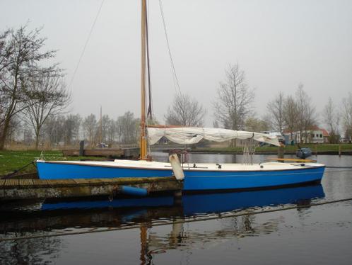 Polyvalk inclusief uitrusting, buitenboordmotor en trailer.