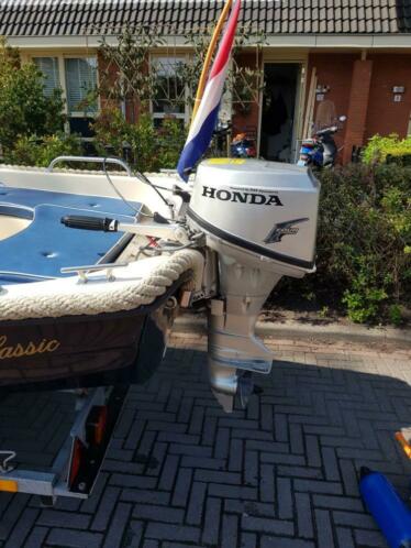 Prachtig sloepje, toerboot 6pers.Honda 2 cyl 6Pk en trailer 